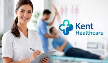 Female physiotherapist assisting a patient in a modern clinic setting with Kent Healthcare branding visible in the background