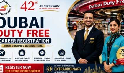 Employees assisting customers inside a luxury Dubai Duty Free retail store at Dubai International Airport.