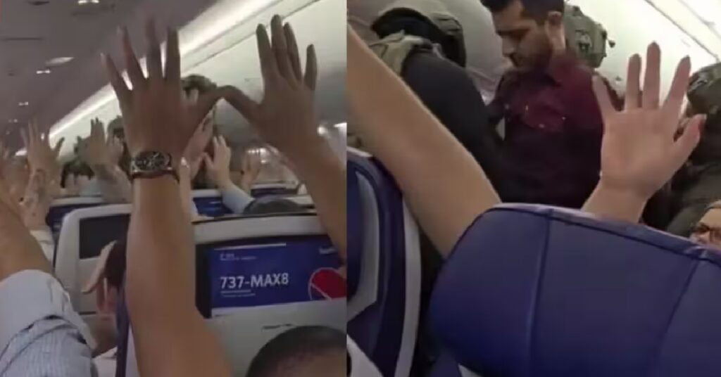 Frontier Airlines Passengers Trapped on Plane എസി ഓഫായി, വെളിച്ചവും നിലച്ചു; പുറത്തിറങ്ങാനാകാതെ വിമാനത്തിനുള്ളിൽ യാത്രക്കാർ! ഒടുവിൽ വാതിൽ തുറക്കാൻ ശ്രമിച്ച് യുവതി 1 AIR 2